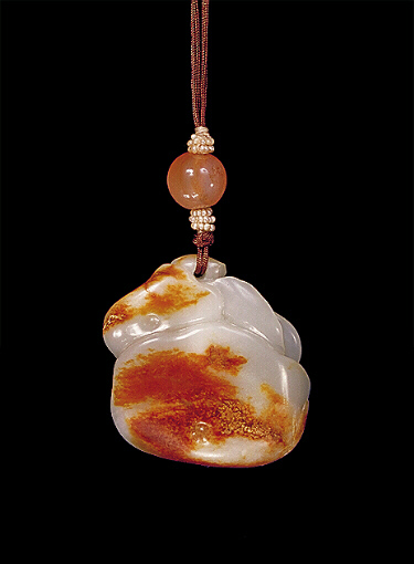 Reverse: Nephrite Pendant, mutton fat colour with the russet colours from the pebble ingeniously carved as mushroom with a bi disc to turn freely.