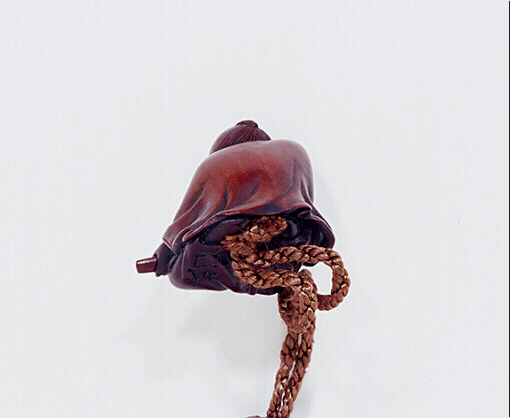 Wood Netsuke of a Man Drawing a Sword From its Scabbard