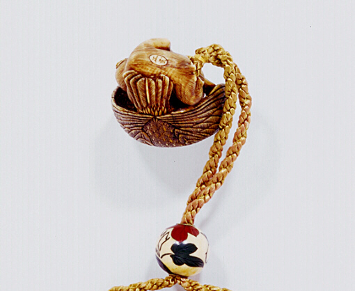Reverse Ivory Eagle Clawing a Monkey Netsuke